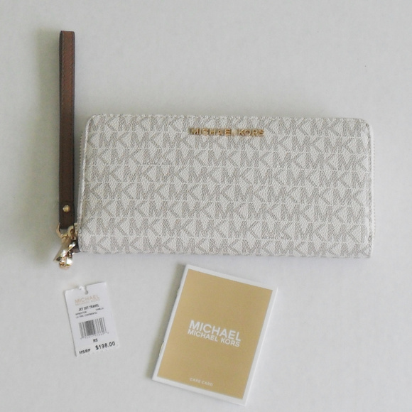 Michael Kors Handbags - Michael Kors Vanilla Acorn Travel Wristlet